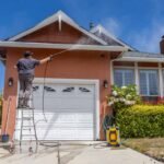 man power washing home 1639241526 